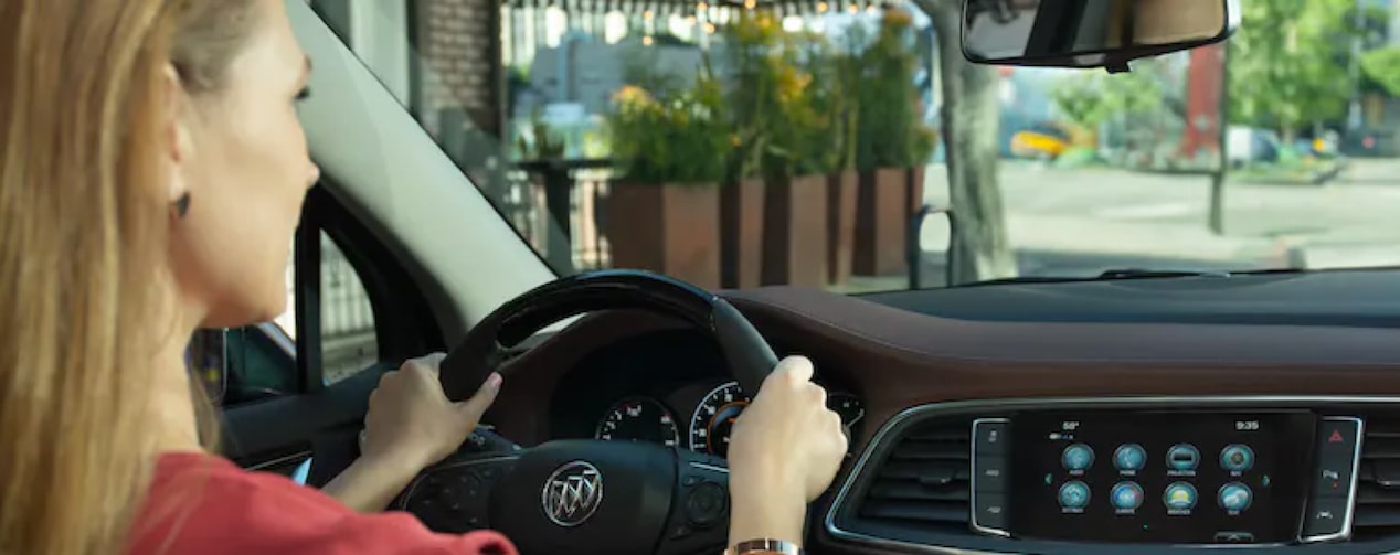 Woman Driving and the View out of her Windshield