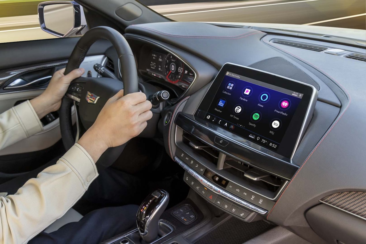 Passenger Side View of Infotainment System and Person Driving