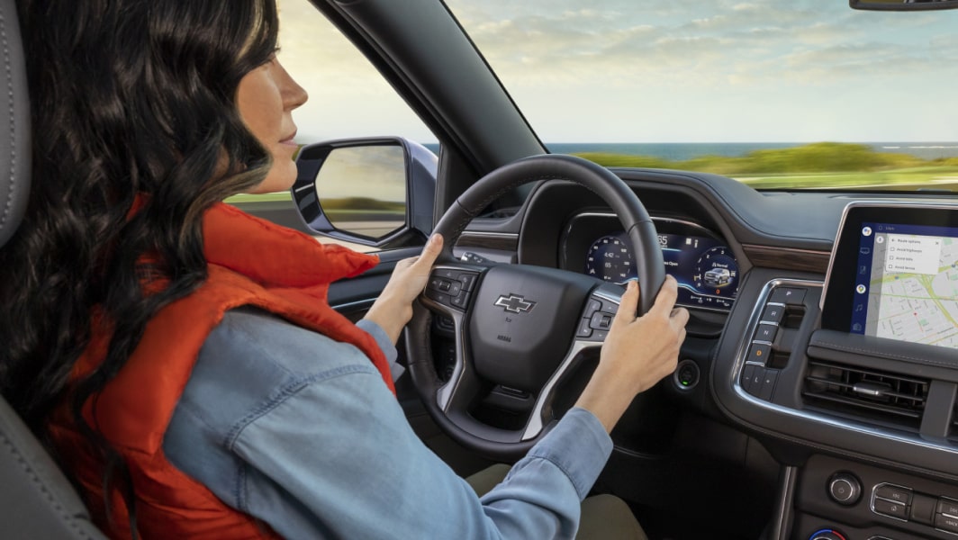 Back Seat View of a Woman Driving