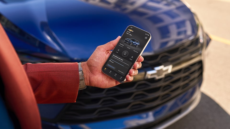 Person Standing in Front of Vehicle using myChevrolet Mobile App