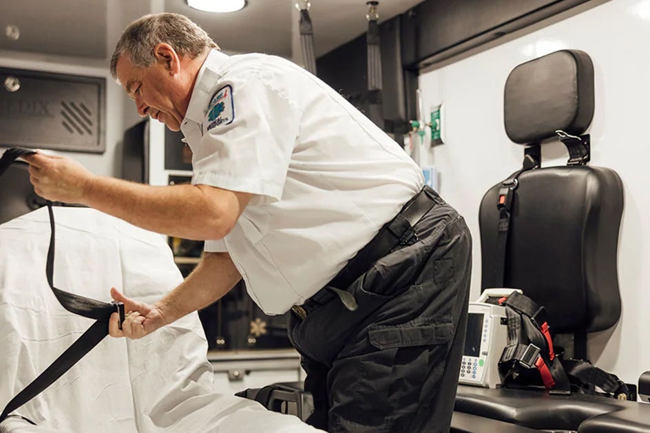 Timothy Kimble Working Inside an Ambulance