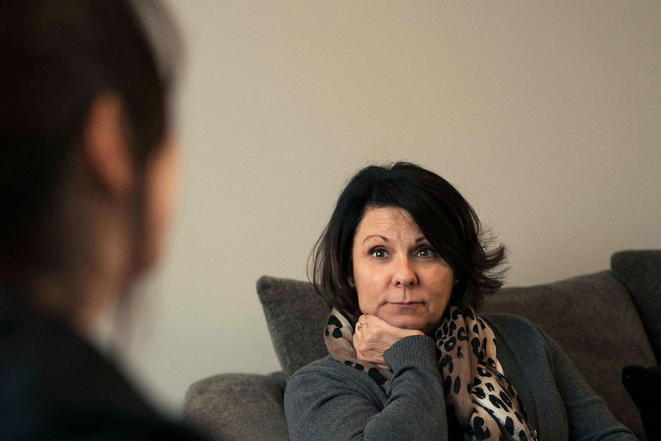 Woman Listening to Daughter Speak